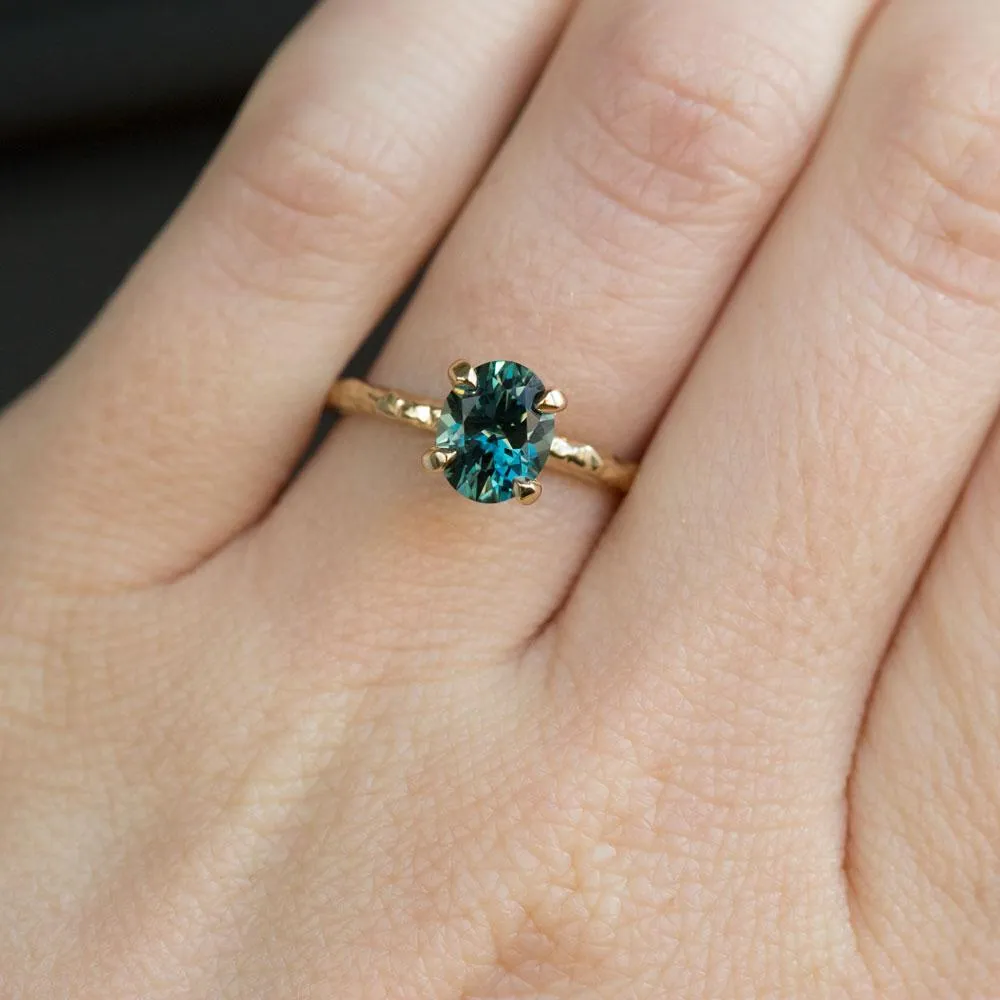 1.55ct Oval Teal Montana Sapphire Engagement Ring in 14k Yellow Gold Evergreen Solitaire