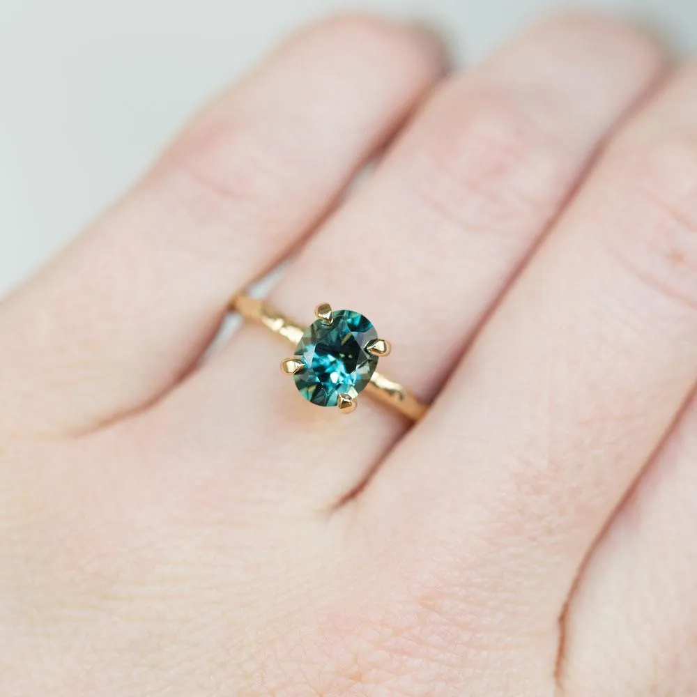 1.55ct Oval Teal Montana Sapphire Engagement Ring in 14k Yellow Gold Evergreen Solitaire