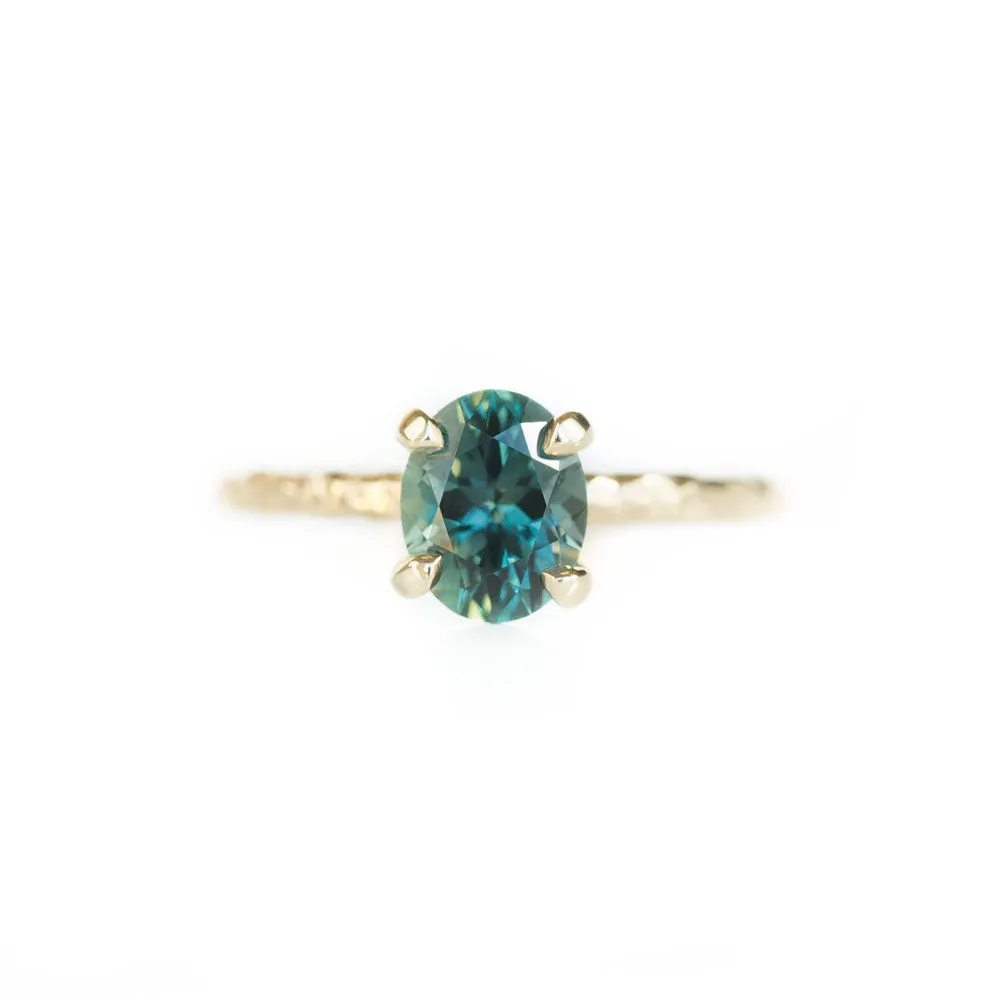 1.55ct Oval Teal Montana Sapphire Engagement Ring in 14k Yellow Gold Evergreen Solitaire